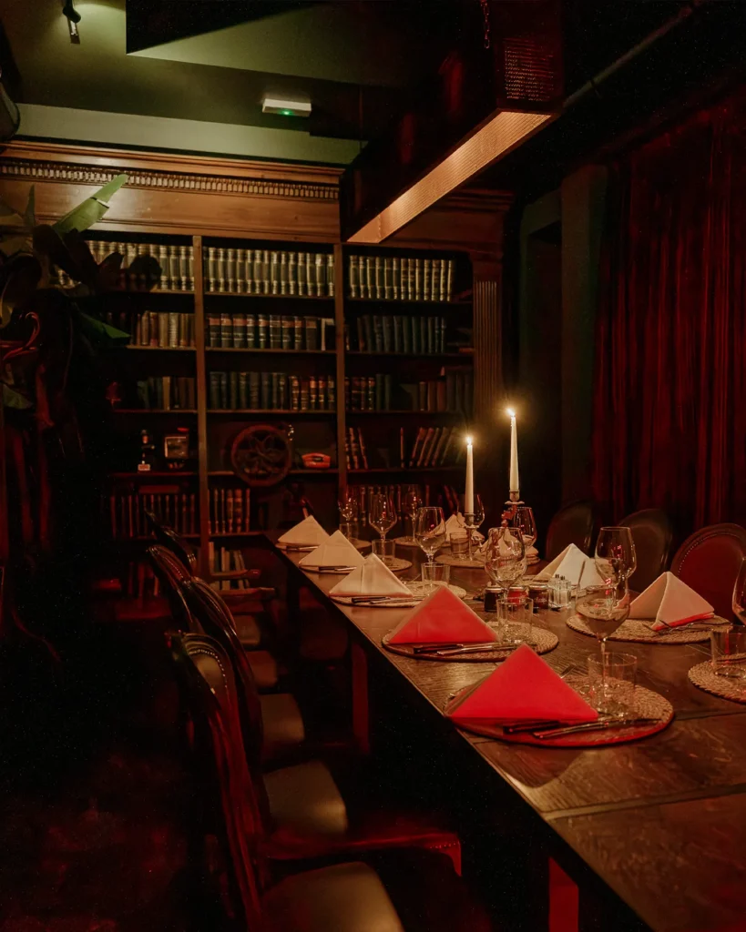 Candlelit dining room at El Porteño Prohibido