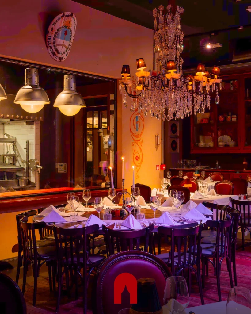 Warmly lit dining room at El Porteño Prohibido