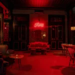 Red-lit lounge area at El Porteño Prohibido