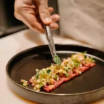 Artfully plated dish served at El Porteño Prohibido
