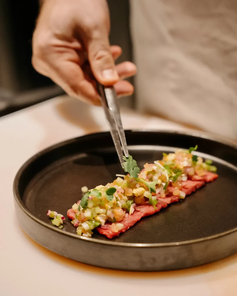 Artfully plated dish served at El Porteño Prohibido