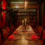 Candlelit private dining table at El Porteño Prohibido