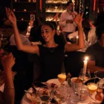 Guests enjoying dinner and drinks inside Giulia Ristorante Paris
