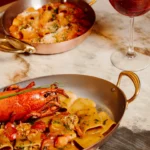 Pasta and seafood dishes served at Giulia Ristorante Paris