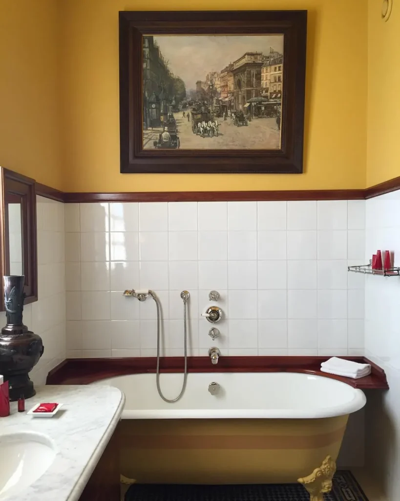 Classic bathroom with a freestanding bathtub at Hotel Costes Paris