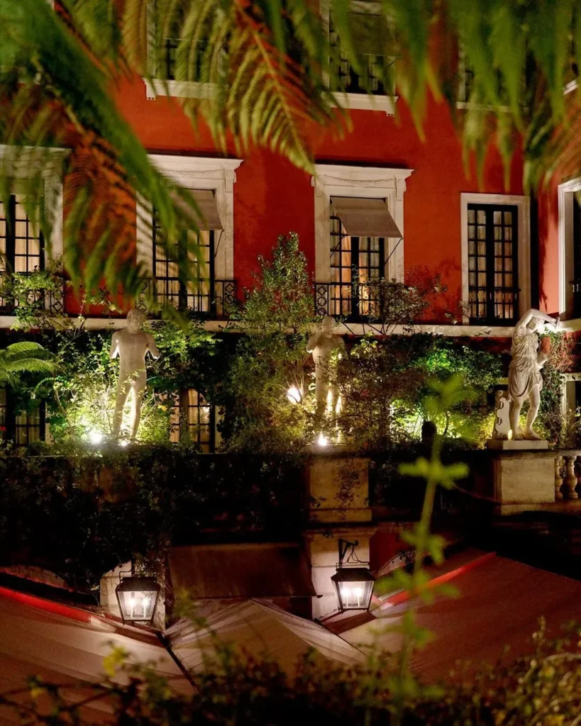 Lush courtyard garden at Hotel Costes in Paris