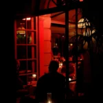 Dark and intimate restaurant interior at Hotel Costes