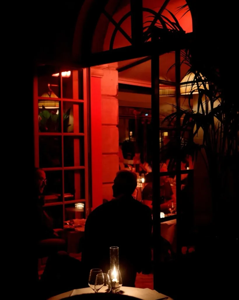 Dark and intimate restaurant interior at Hotel Costes