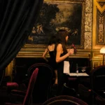 Elegant dining interior with classic artwork at Hotel Costes