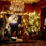 Festively decorated interior with a chandelier at Hotel Costes Paris