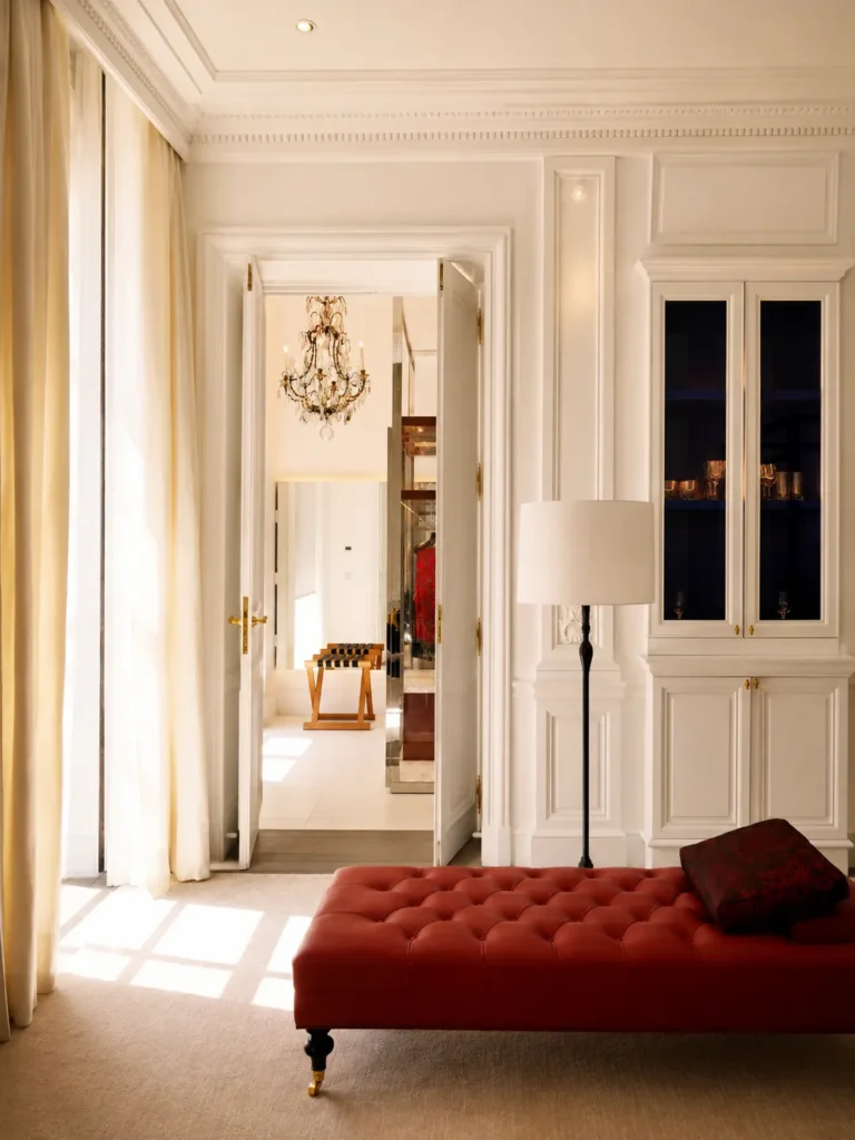 Elegant sunlit hallway with classic decor at Hotel Costes Paris