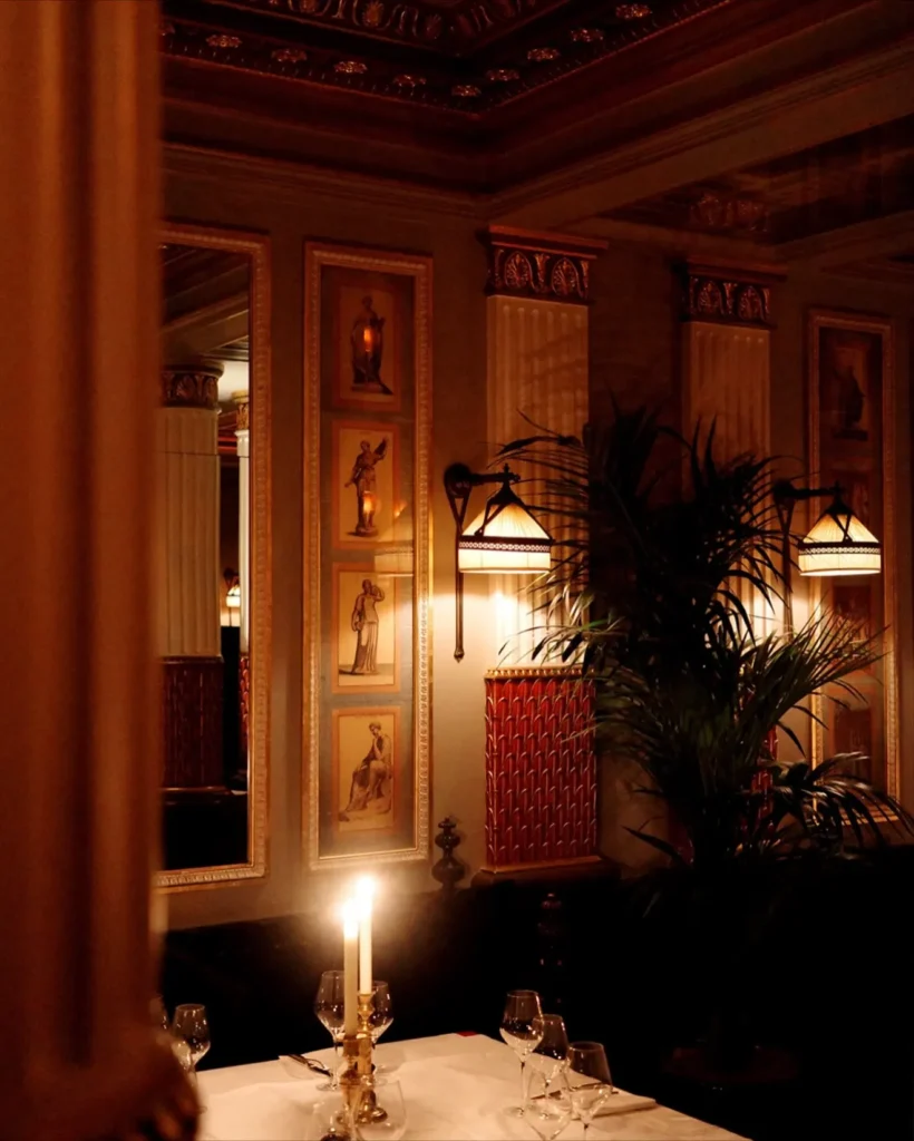 Warmly lit interior hallway at Hotel Costes in Paris