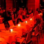 Red-lit dining room at Hotel Costes in Paris