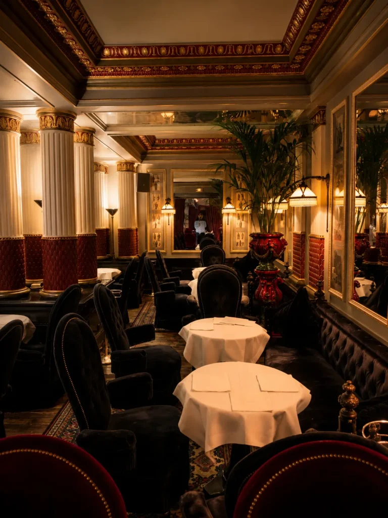 Candlelit restaurant interior at Hotel Costes in Paris