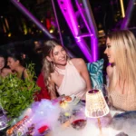 Guests enjoying cocktails and drinks at JustMe Milano