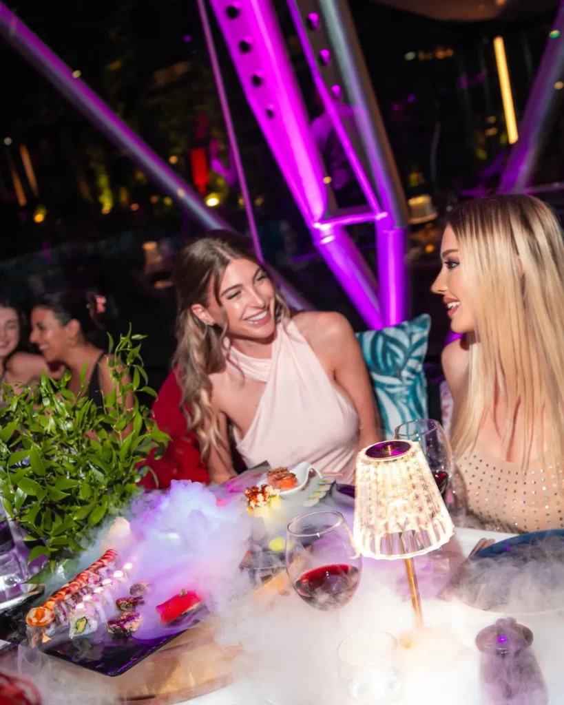 Guests enjoying cocktails and drinks at JustMe Milano
