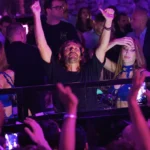 Guests enjoying the nightlife atmosphere at JustMe Milano