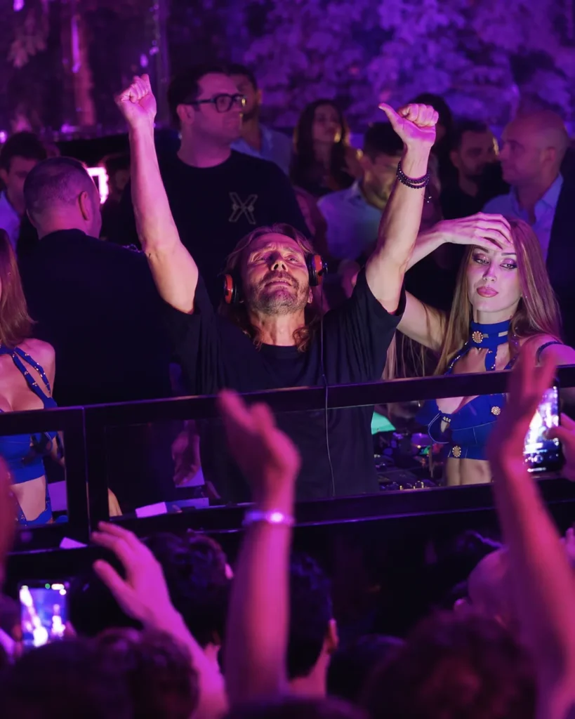 Guests enjoying the nightlife atmosphere at JustMe Milano