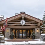Snow-covered exterior of K2 Palace in Courchevel