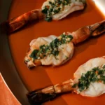 Grilled prawns with herbs served at Kinugawa Rive Gauche in Paris