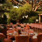 Outdoor dining area surrounded by greenery at Kinugawa Rive Gauche