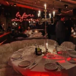 Elegant candlelit dining setting at La Ferme Saint-Amour Courchevel
