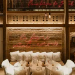 Cozy dining area with plush seating at La Ferme Saint-Amour Courchevel