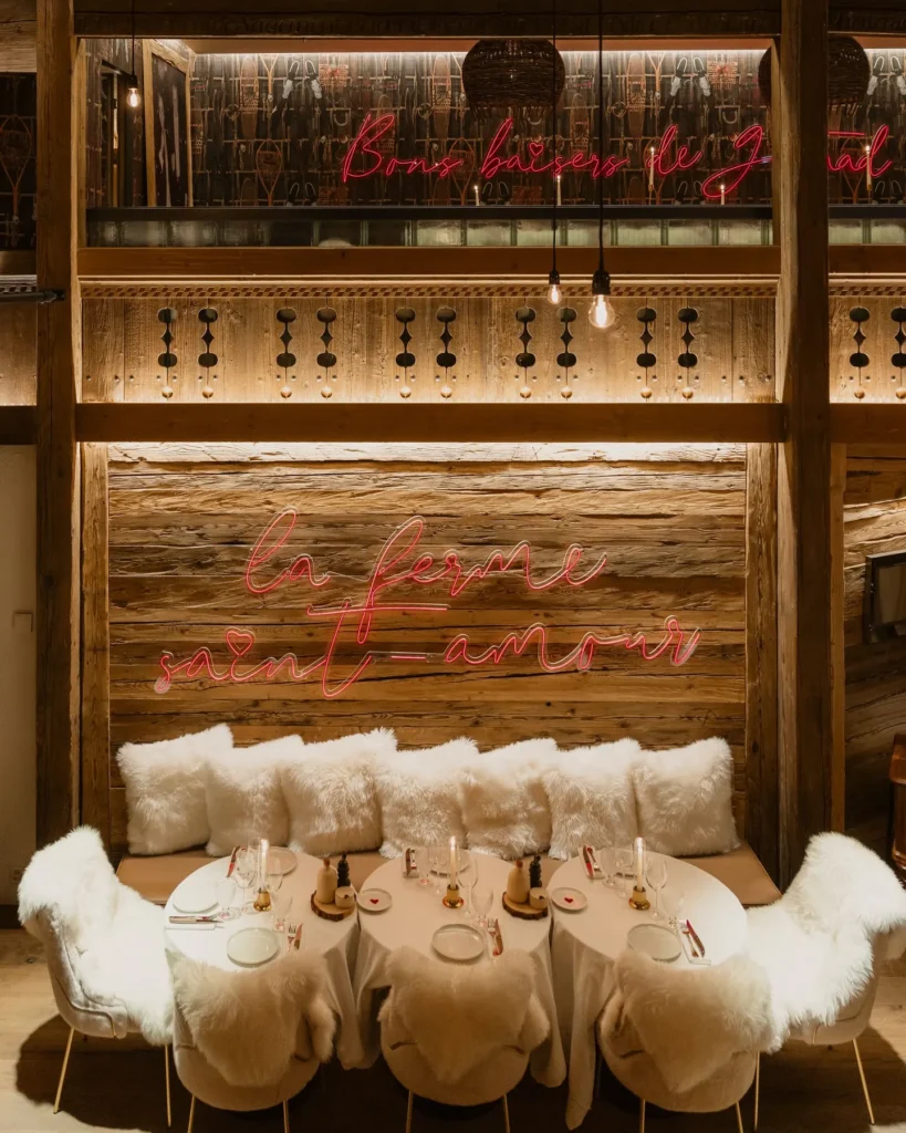 Cozy dining area with plush seating at La Ferme Saint-Amour Courchevel