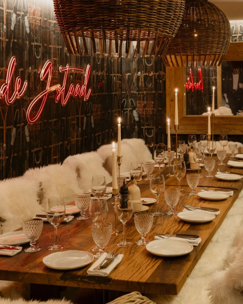 Elegant table setting inside La Ferme Saint-Amour Courchevel