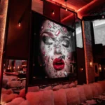 Luxurious lounge interior with artwork at La Ferme Saint-Amour Courchevel
