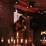 Live entertainment in the candlelit dining room at La Ferme Saint-Amour Courchevel