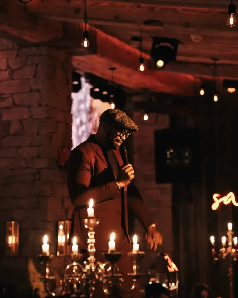 Live entertainment in the candlelit dining room at La Ferme Saint-Amour Courchevel