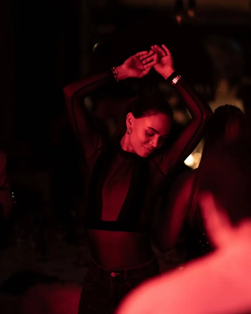 Dancer enjoying the lively atmosphere at La Ferme Saint-Amour Courchevel