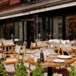 Outdoor dining terrace at La Ferme Saint-Amour Courchevel