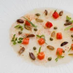 Refined gourmet dish presented at La Ferme Saint-Amour Courchevel