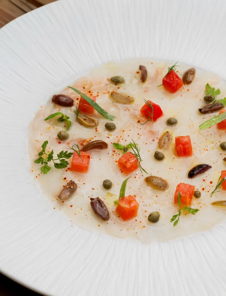Refined gourmet dish presented at La Ferme Saint-Amour Courchevel