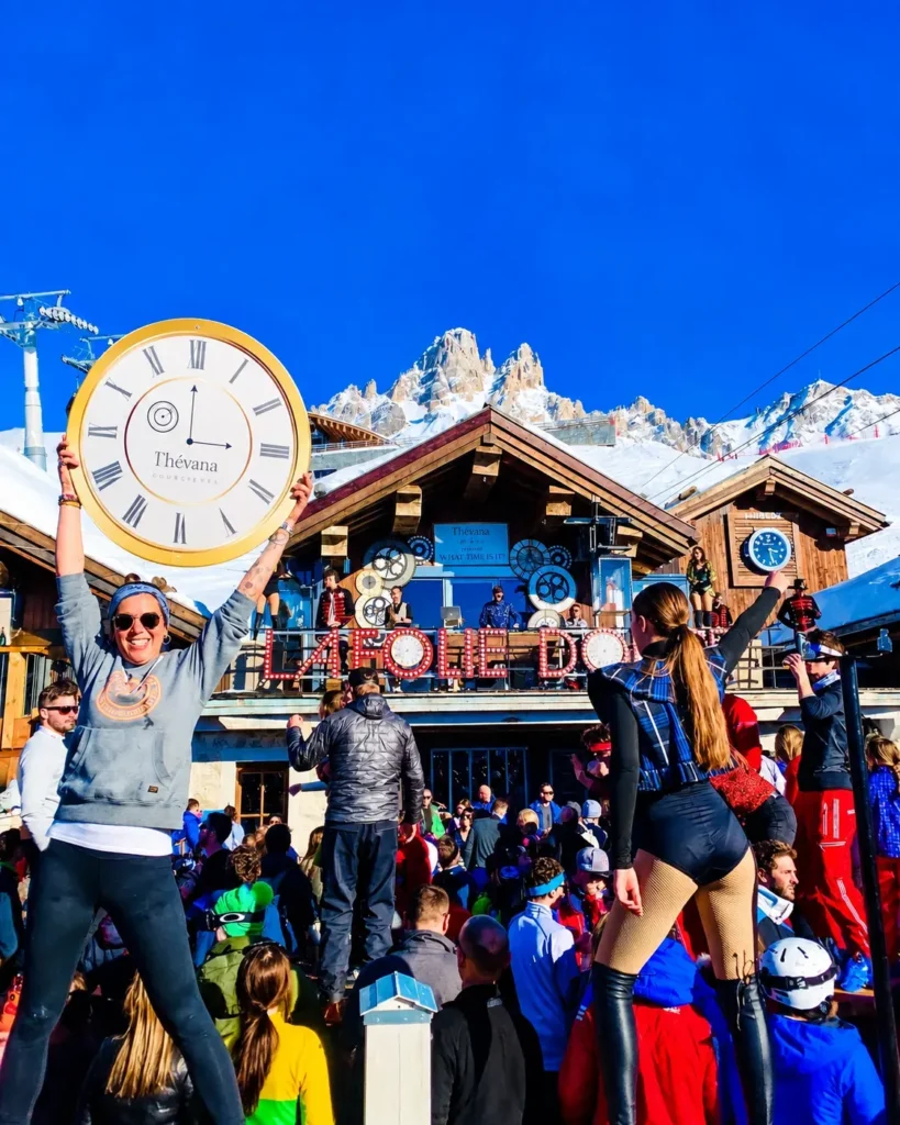 Guests celebrating during an après-ski party at La Folie Douce Méribel