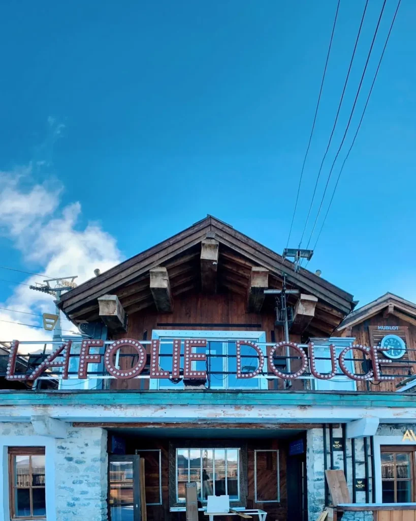 La Folie Douce Méribel chalet surrounded by snowy mountains