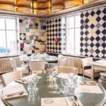 Elegant dining room interior at La Folie Douce Méribel