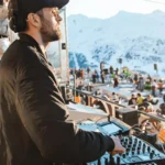 Guest enjoying mountain views from La Folie Douce Méribel