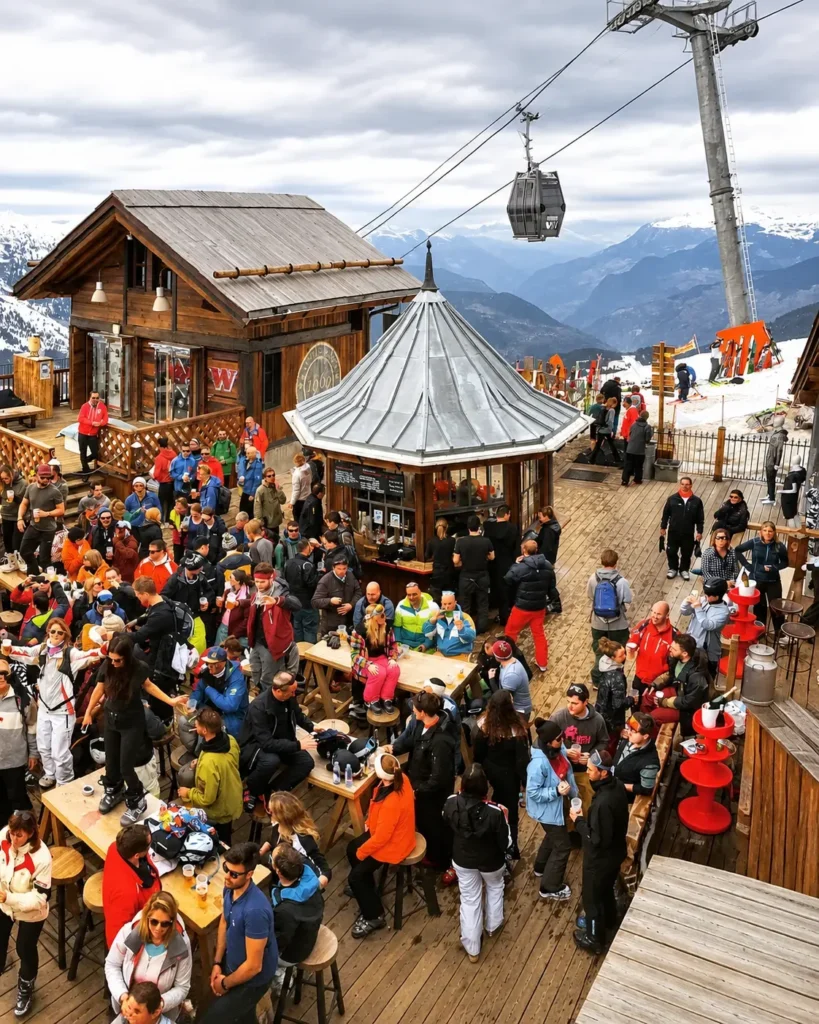 Guests enjoying an outdoor après-ski party at La Folie Douce Méribel