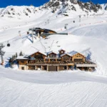 La Folie Douce Méribel surrounded by snowy ski slopes and mountains