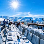 Sunny snow-covered terrace with mountain views at La Folie Douce Méribel
