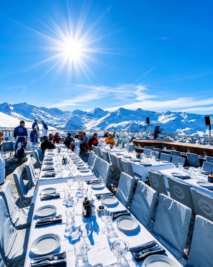 Sunny snow-covered terrace with mountain views at La Folie Douce Méribel