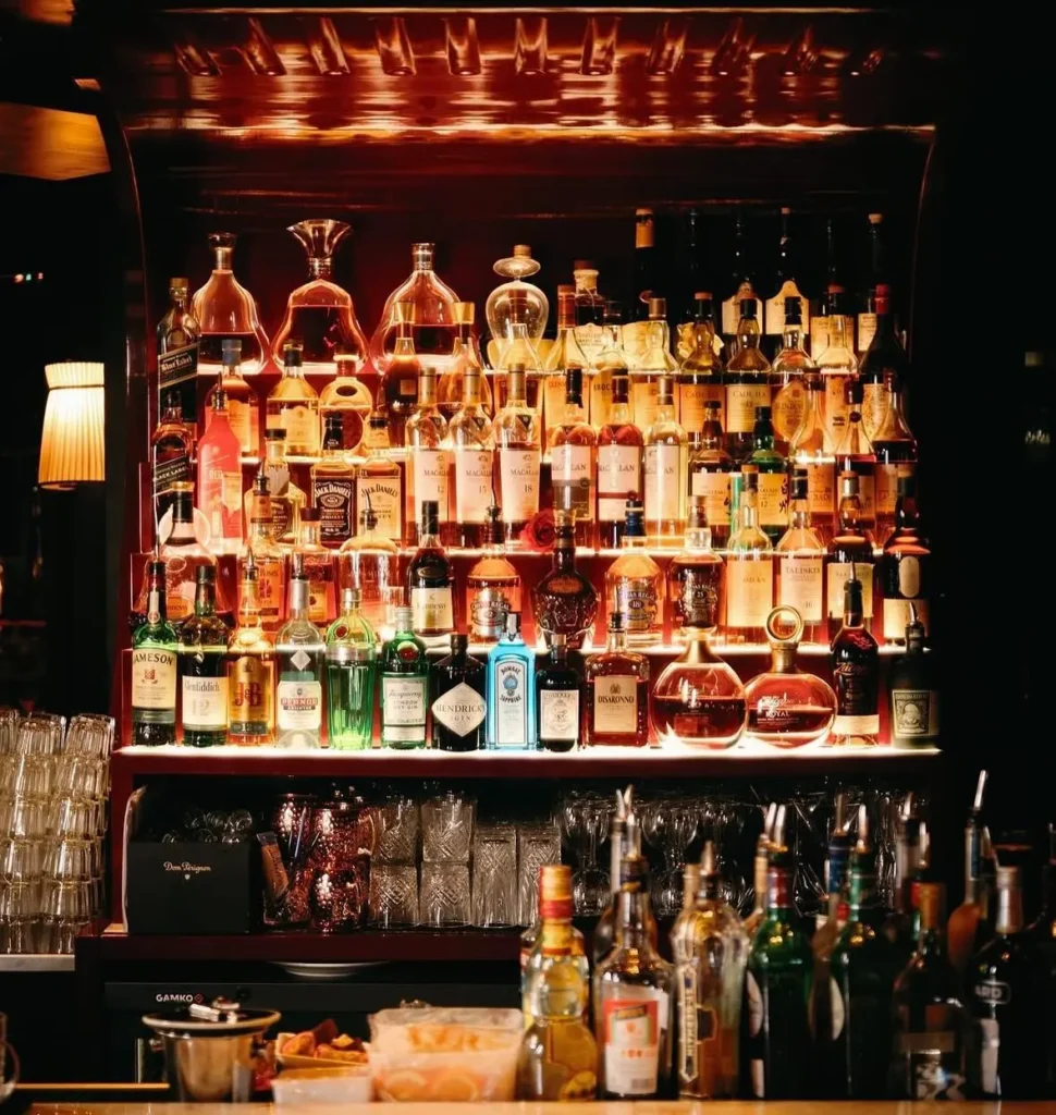 Well-stocked cocktail bar at La Mangeoire Courchevel