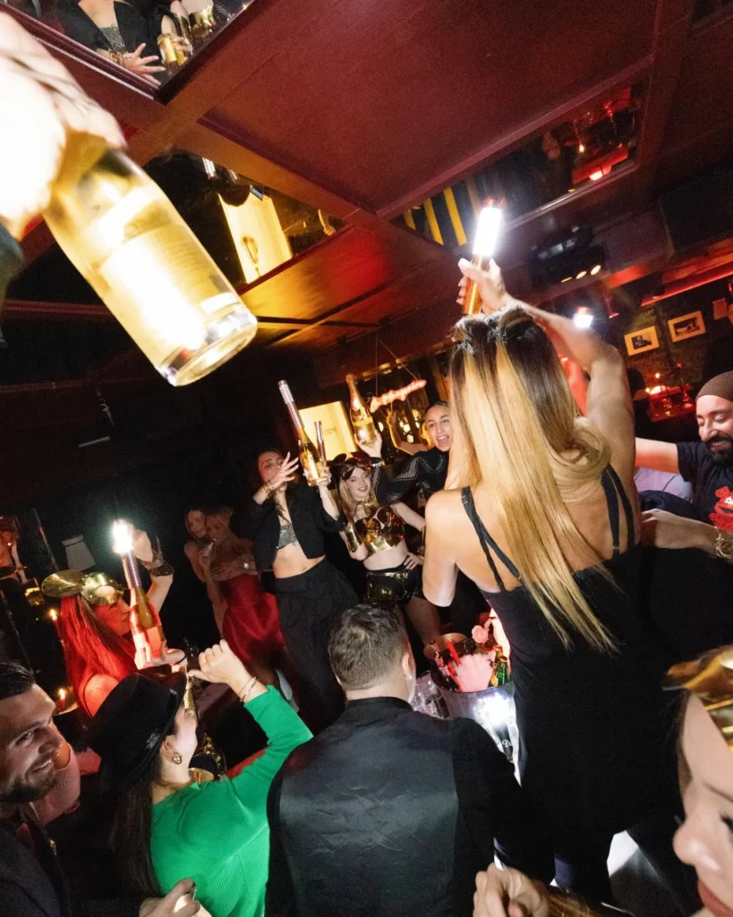 Champagne celebration during an evening at La Mangeoire Courchevel