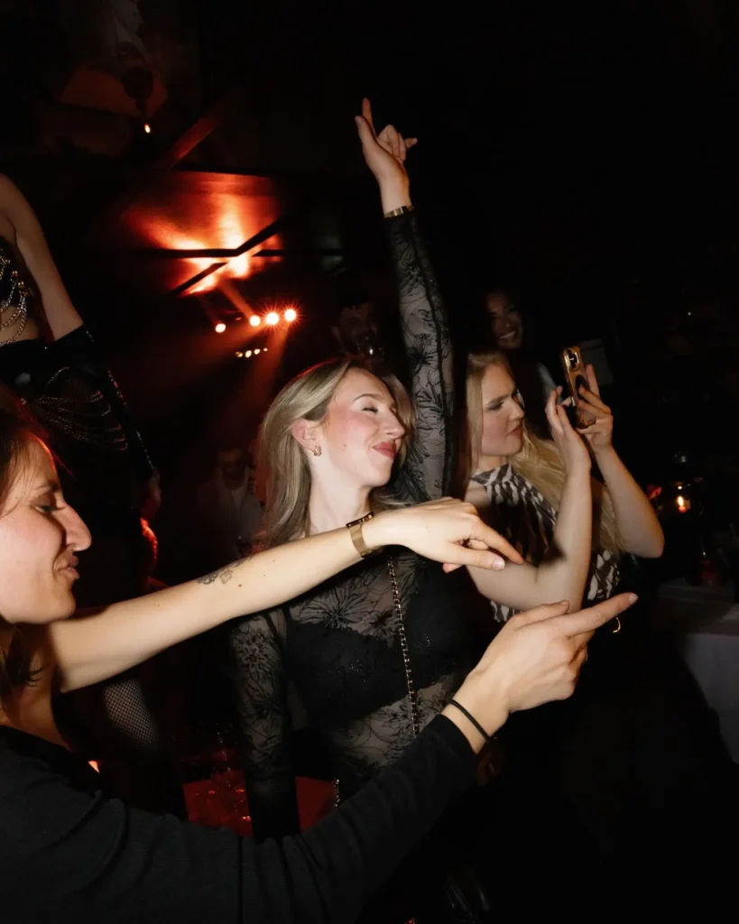 Guests dancing and enjoying the nightlife at La Mangeoire Courchevel