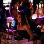 Guests enjoying the lively nightlife atmosphere at La Mangeoire Courchevel
