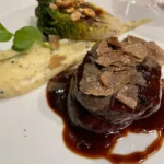 Beef tenderloin with vegetables and sauce served at La Saulire Courchevel