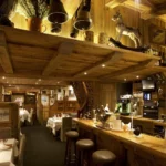 Traditional wooden bar inside La Saulire Courchevel